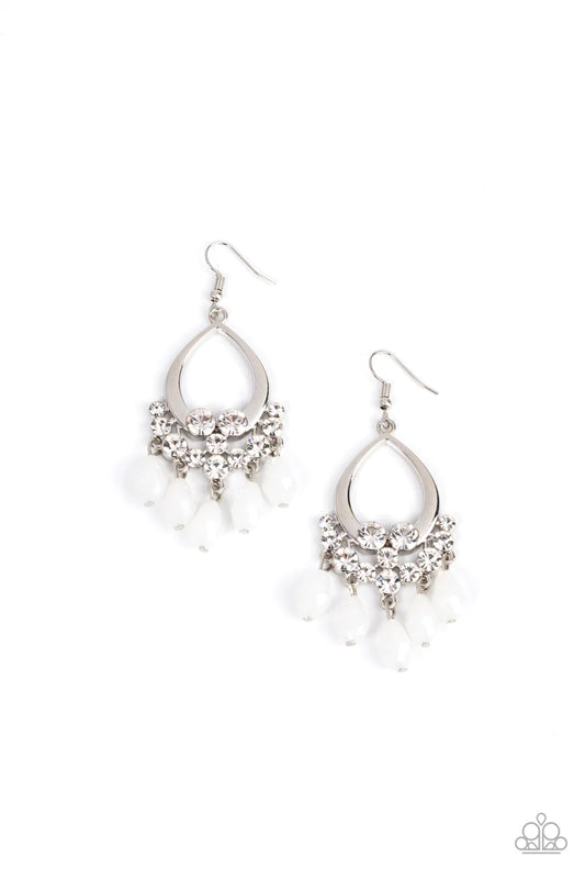 Paparazzi Accessories Famous Fashionista - White Faceted and opaque white teardrop gems cascade from a collection of bubbly white rhinestones at the bottom of a shiny silver teardrop frame, creating a glamorous fringe. Earring attaches to a standard fishh