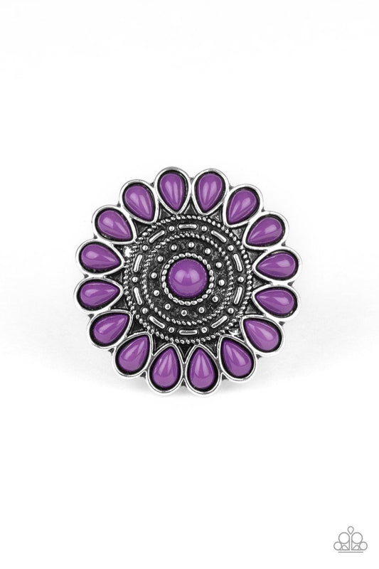 Paparazzi Accessories Posy Paradise - Purple A collection of vivacious purple beaded petals flare out from a textured silver center, creating a whimsical flower atop the finger. Features a stretchy band for a flexible fit. Sold as one individual ring. Jew