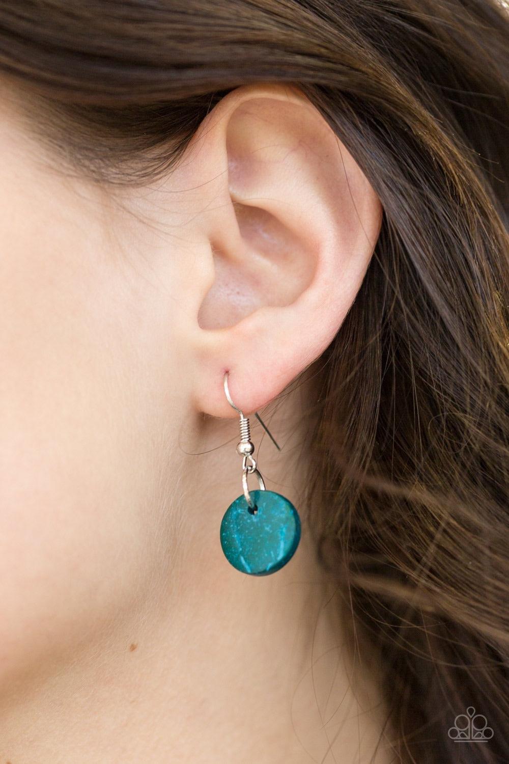Paparazzi Accessories Hoppin Honolulu - Blue Tinted in a refreshing blue finish, distressed wooden discs trickle along strands of knotted brown cording, creating colorful layers below the collar for a seasonal vibe. Features a button-loop closure. Jewelry