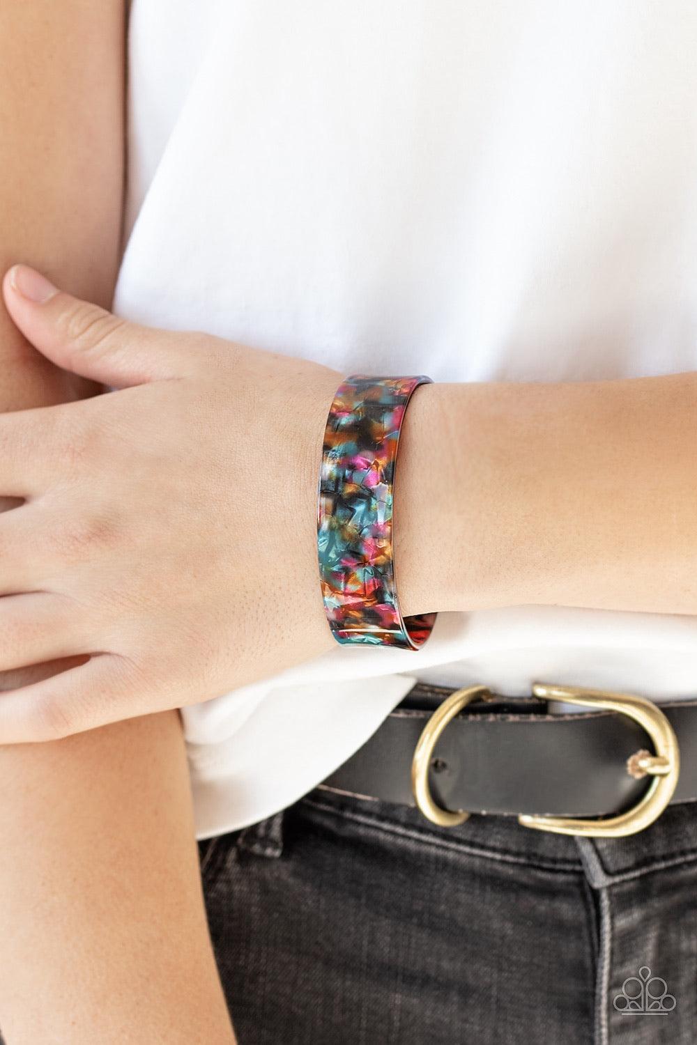 Paparazzi Accessories Glaze Daze - Multi Featuring metallic-like shimmer, a speckled acrylic cuff waves across the wrist for a colorfully retro look. Jewelry