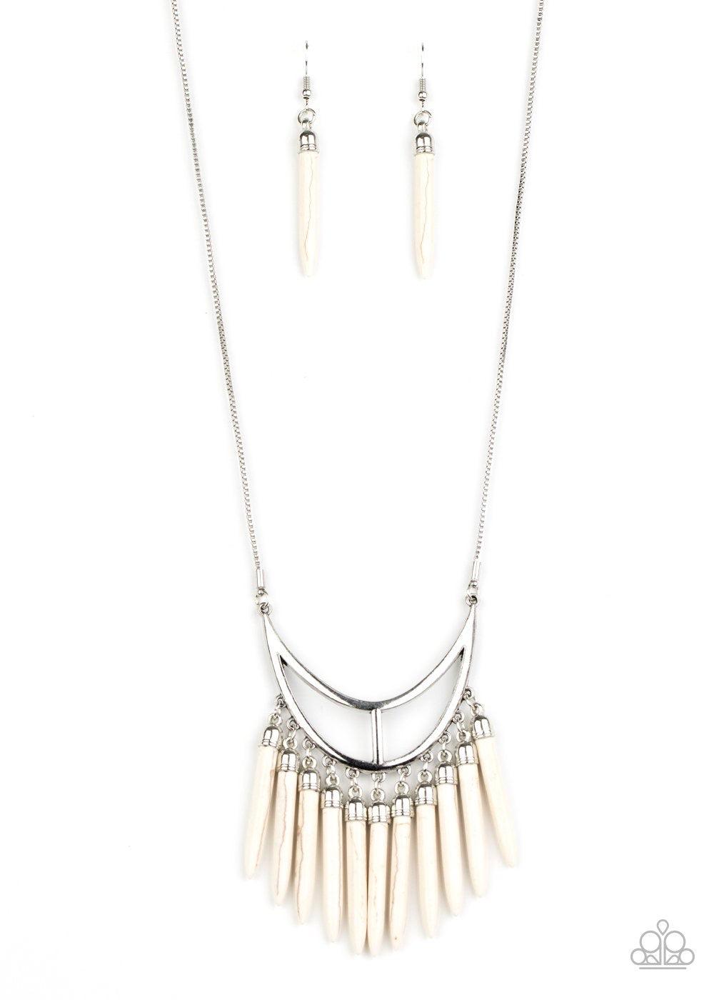Paparazzi Accessories Stone Age A-Lister - White Capped in dainty silver fittings, refreshing white stone tusk-like bars dangle from the bottom of an airy silver crescent frame, creating an earthy fringe at the bottom of a lengthened silver chain. Feature