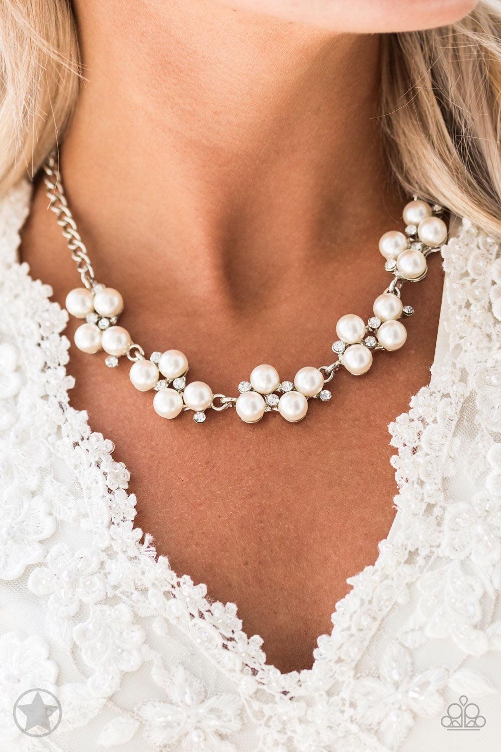 Paparazzi Accessories Love Story - White Dainty clusters of shimmery white pearls are dusted with sparkling rhinestones, creating a romantic, timeless design. Features an adjustable clasp closure. Jewelry