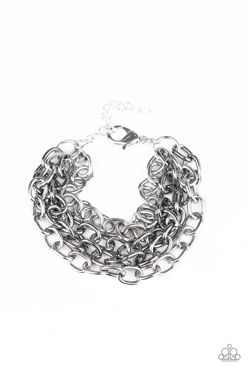 Paparazzi Accessories Fast Ball -Multi Four strands of bold gunmetal and silver chain layer across the wrist for an edgy look. Features an adjustable clasp closure. Jewelry