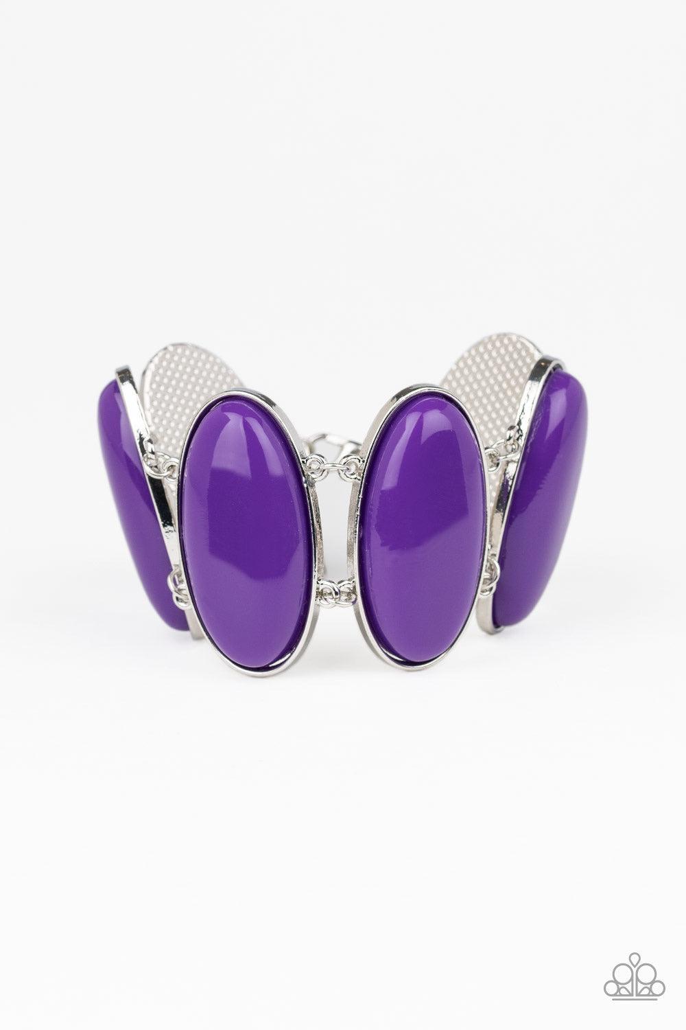 Paparazzi Accessories Power Pop - Purple Dotted with oblong purple beaded centers, vibrant silver frames link around the wrist for a powerful pop of color. Features an adjustable clasp closure. Jewelry