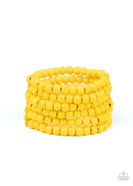 Paparazzi Accessories Diving in Maldives - Yellow Held in place with rectangular wooden fittings, a collection of sunny yellow wooden beads are threaded along stretchy bands around the wrist, creating colorful layers. Sold as one individual bracelet. Jewe