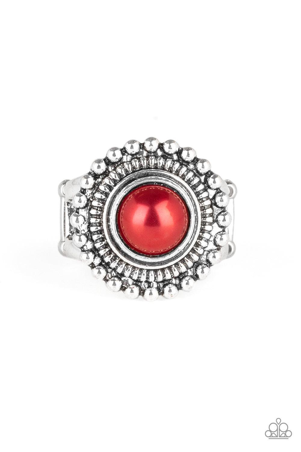 Paparazzi Accessories Regal Royal - Red A roung red bead is pressed into the center of a textured silver frame radiating in a ring of silver studs for a whimsical pop of color. Features a stretchy band for a flexible fit. Jewelry