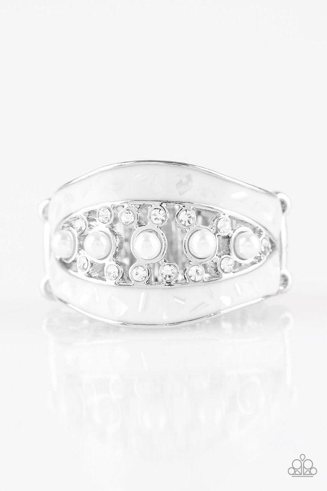 Paparazzi Accessories Royal Treasury - White Flecked in shell-like iridescence, shimmery white bands join around a bubbly pearl drop and white rhinestone center for a refined look. Features a stretchy band for a flexible fit. Sold as one individual ring.