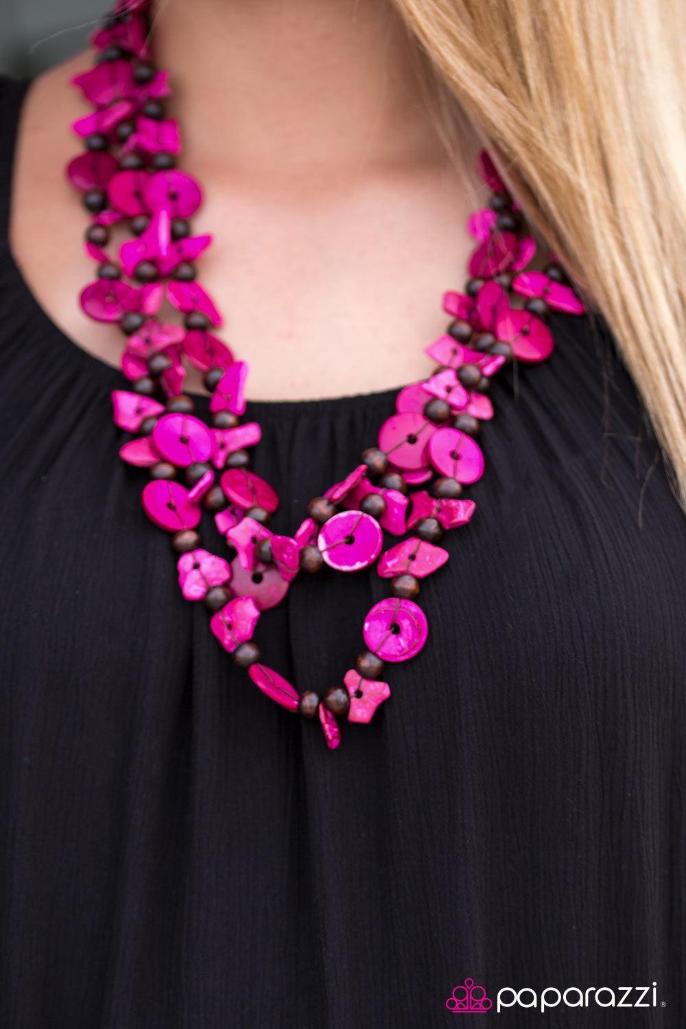 Paparazzi Accessories Living The Tropical Life - Pink Tinted in vivacious pink hues, bits of wooden beads and discs join earthy wooden beads along an elongated strand of thread. Try double-wrapping or even triple-wrapping around the neck for a colorfully