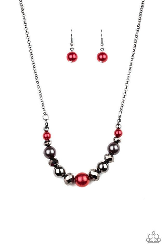 Paparazzi Accessories The Big-Leaguer - Multi A collection of pearly red, classic gunmetal, and crystal-like hematite beads are threaded along an invisible wire below the collar for a glamorous look. Features an adjustable clasp closure. Sold as one indiv