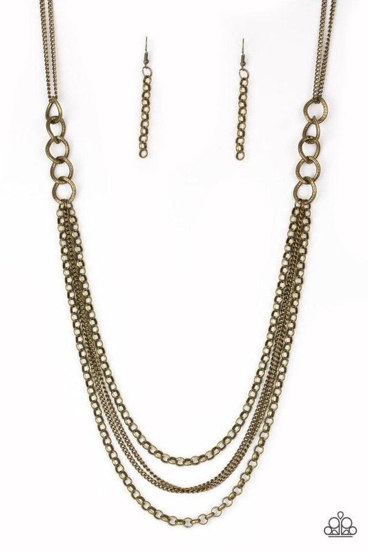 Paparazzi Accessories Mechanical Mayhem - Brass Bold brass chain links give way to layers of mismatched brass chain, creating a dramatic industrial collision. Features an adjustable clasp closure. Jewelry