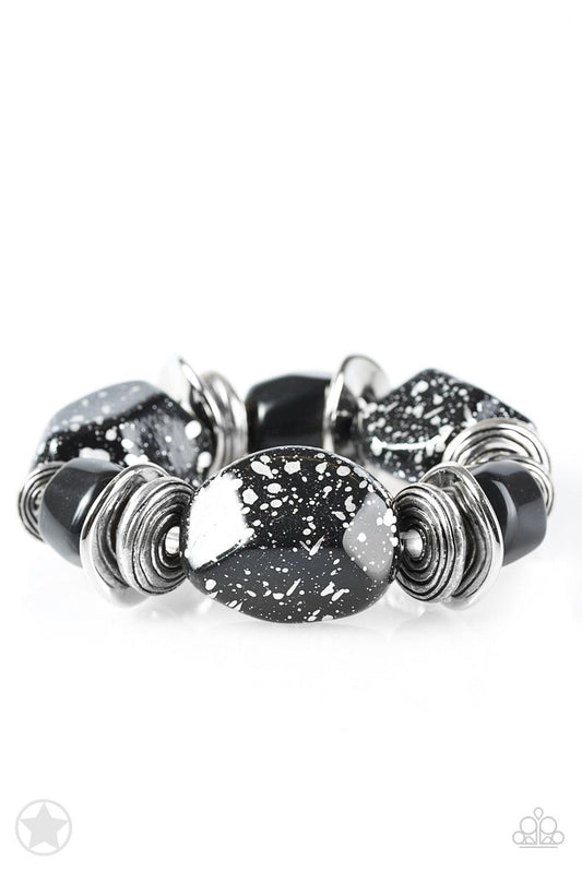 Paparazzi Accessories Glaze of Glory - Black Chunky black beads with speckles of silver and a gorgeous glazed finish are threaded along a stretchy band with thick silver rings. Jewelry