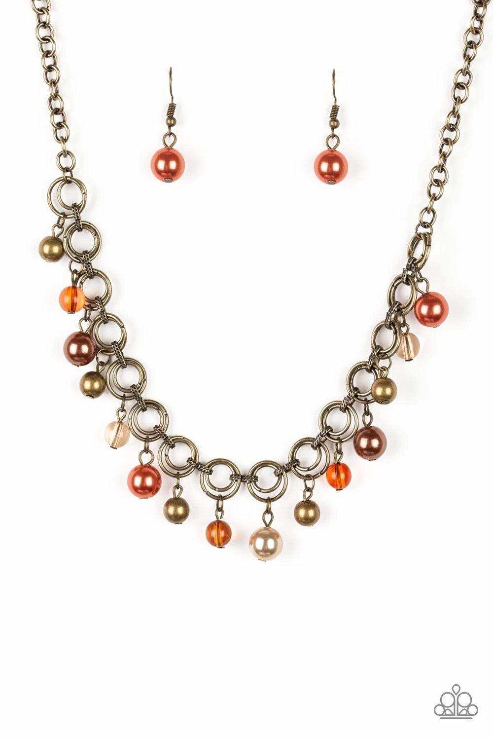 Paparazzi Accessories Fiercely Fancy - Multi Featuring pearly and glassy finishes, an array of brass, brown, and orange beads swing from a double-linked brass chain, creating a fancy fringe below the collar. Features an adjustable clasp closure. Sold as o