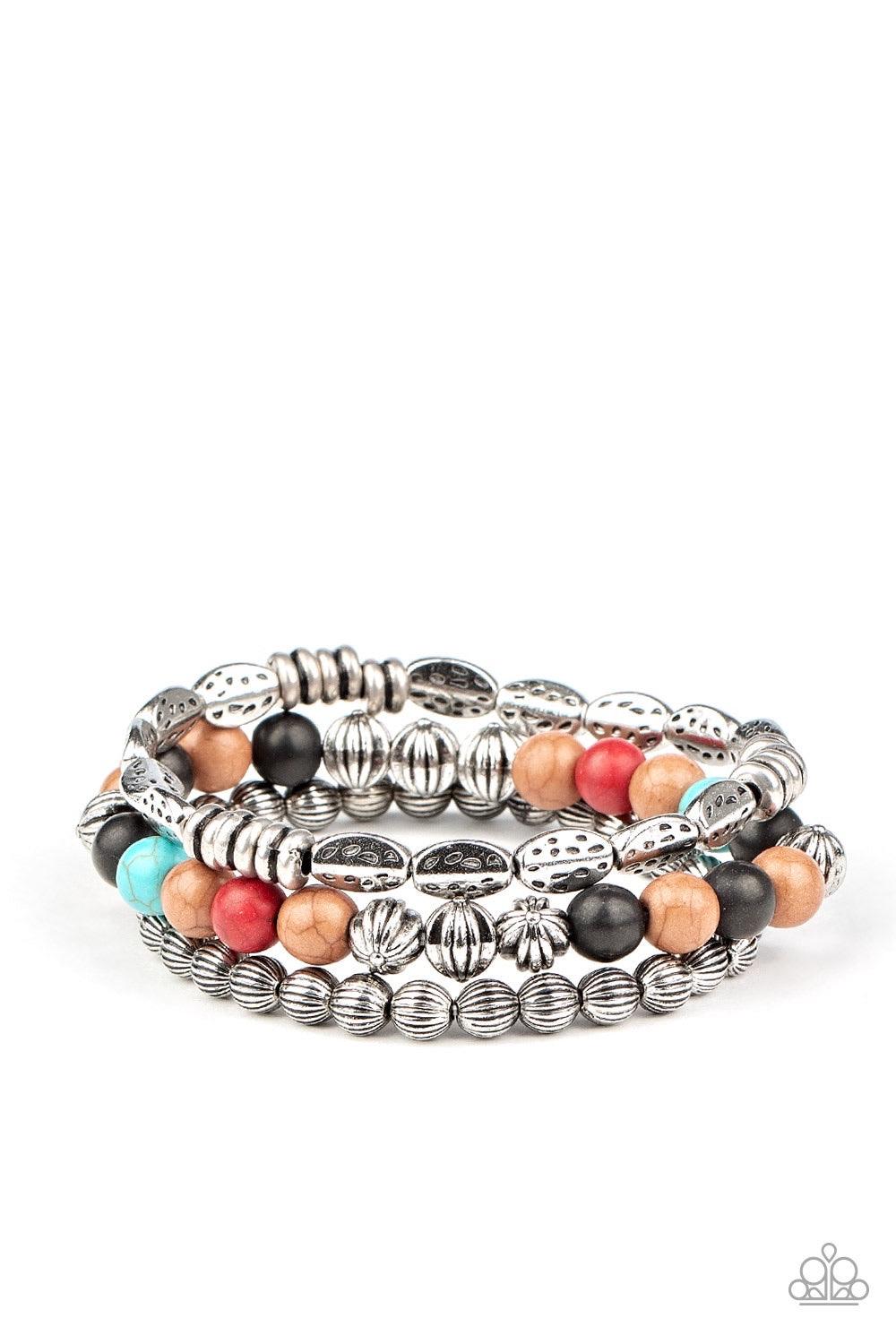 Paparazzi Accessories Trail Mix Mecca - Multi An earthy collision of multicolored stones, ornate silver beads and hammered silver accents are threaded along stretchy bands around the wrist, creating colorful layers. Sold as one set of three bracelets. Jew