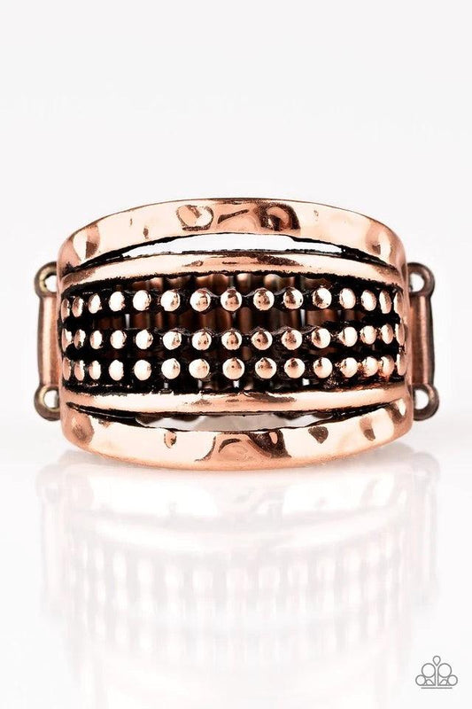 Paparazzi Accessories Trailblazin Trails - Copper Delicately hammered in shimmering detail, two copper bands flank rows of smooth and dotted bands for a collision of glistening textures. Features a stretchy band for a flexible fit. Sold as one individual