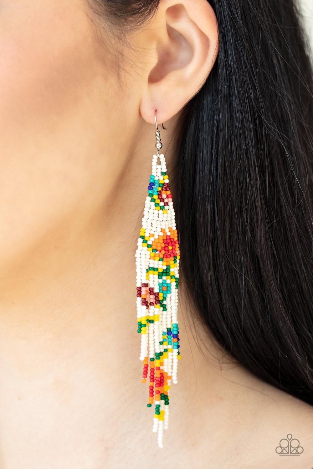 Paparazzi Accessories Beaded Gardens - White Strands of yellow, green, blue, white, red, orange, and pink seed beads colorfully weave into a vivaciously floral beaded fringe. Earring attaches to a standard fishhook fitting. Jewelry