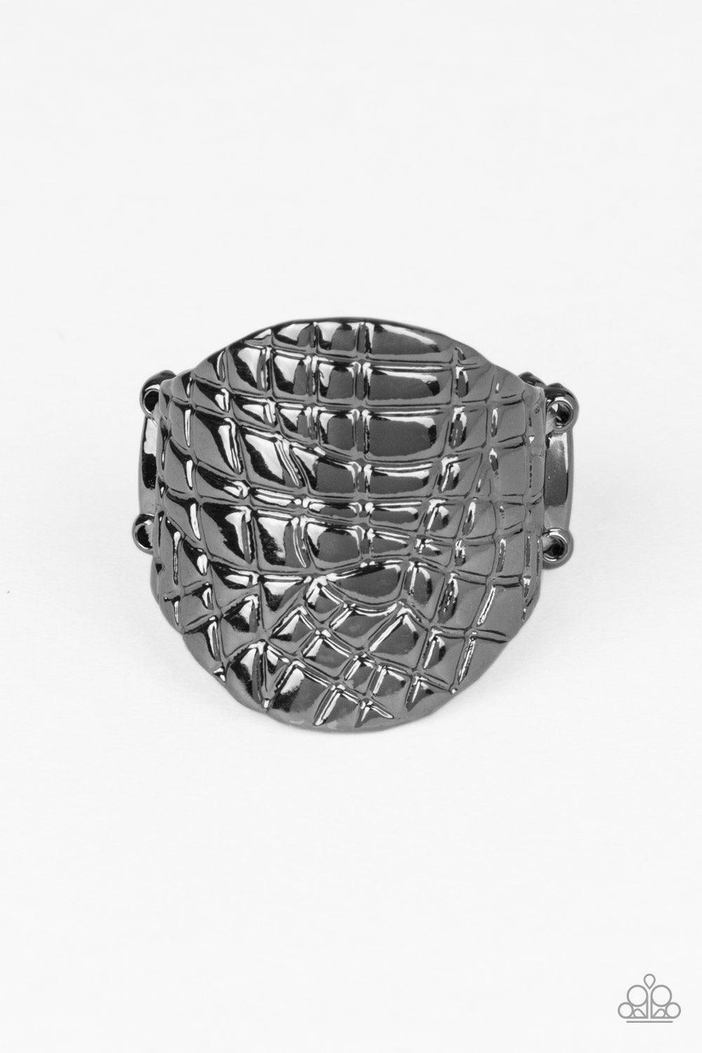 Paparazzi Accessories Metal Jungle - Black Etched in an abstract linear pattern, a thick gunmetal frame curls around the finger for an edgy metallic look. Features a stretchy band for a flexible fit. Jewelry