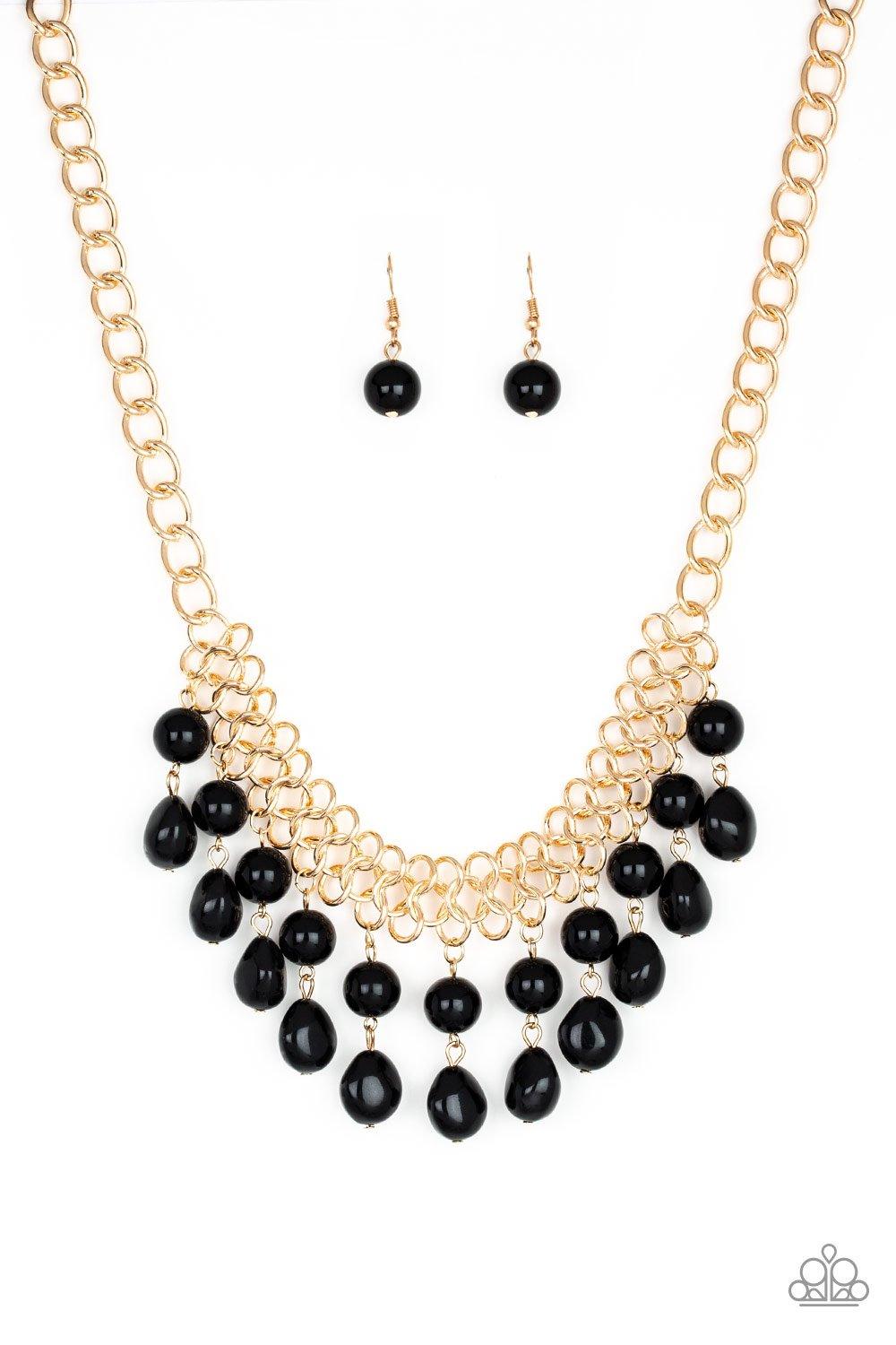 Paparazzi Accessories 5th Avenue Fleek - Black A collection of classic and imperfect black beads dangle from a web of interlocking gold links below the collar, adding a modern twist to the timeless palette. Features an adjustable clasp closure. Sold as on