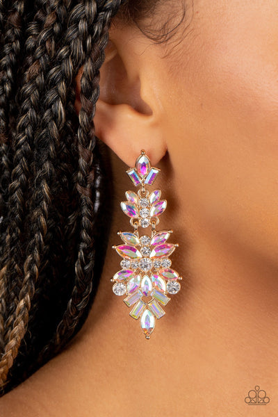 Paparazzi Accessories Frozen Fairytale - Multi Featuring white and iridescent finishes, trestles of round, marquise, and emerald cut rhinestones cluster into three sparkly segments as they link into a jaw-dropping lure. Earring attaches to a standard post