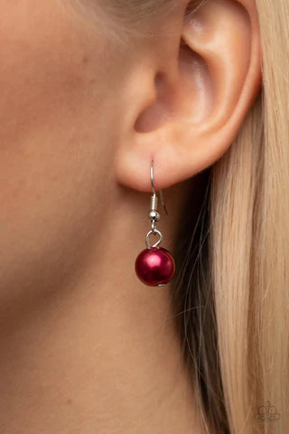 Paparazzi Accessories Powerhouse Pose - Red Oversized red pearls dance from the bottoms of shiny silver ovals that delicately cluster along a chunky silver chain, resulting in a luxurious fringe below the collar. Features an adjustable clasp closure. Sold
