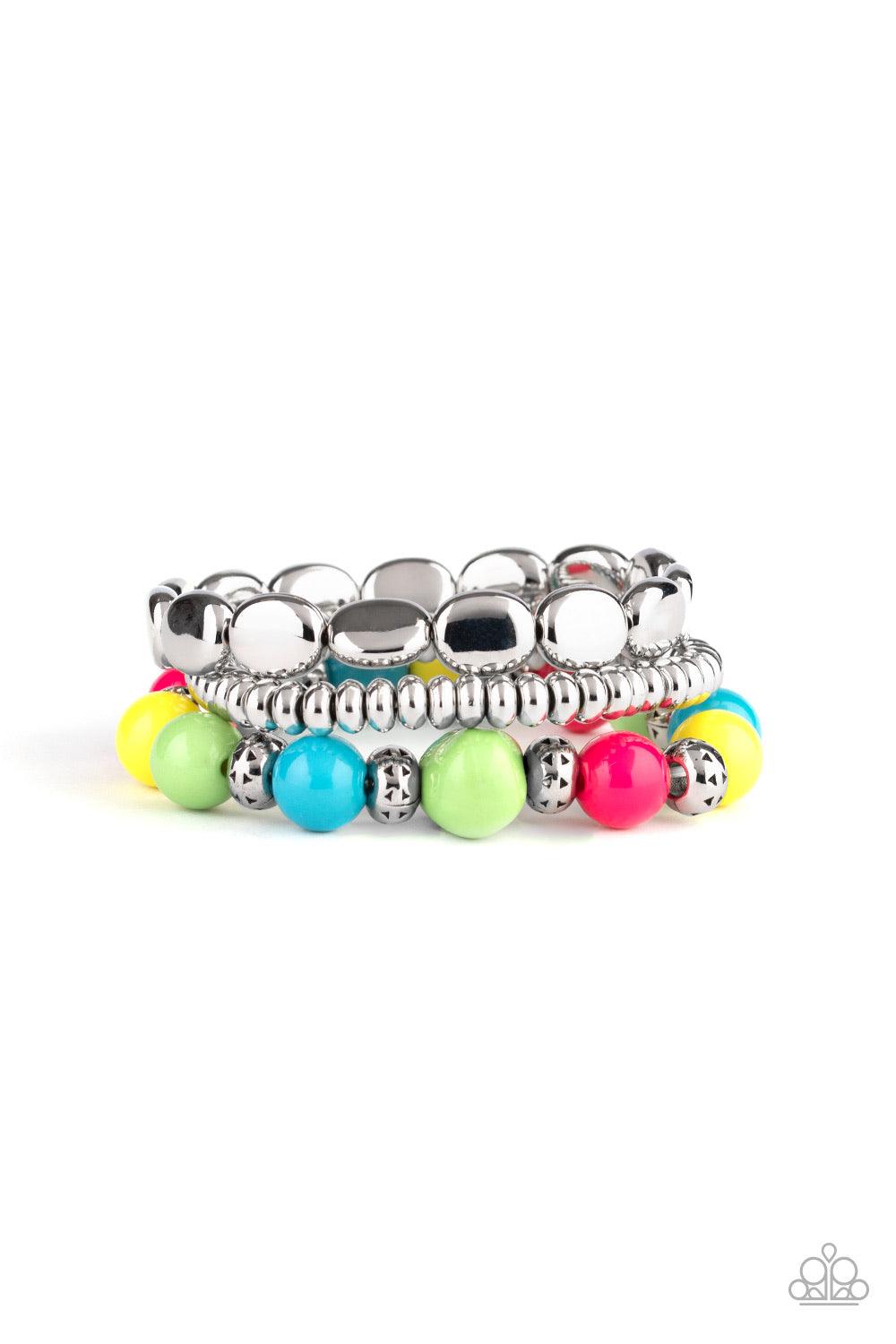 Paparazzi Accessories Prismatic Pop - Multi Varying in shape and size, a shiny collection of yellow, blue, green, pink, and silver beads are threaded along stretchy bands around the wrist for a vivaciously layered look. Jewelry