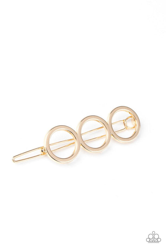 Paparazzi Accessories A HOLE Lot of Trouble - Gold A trio of gold rings delicately connect into an airy minimalist inspired frame. Features a clamp barrette closure. Sold as one individual hair clip. Hair Accessories