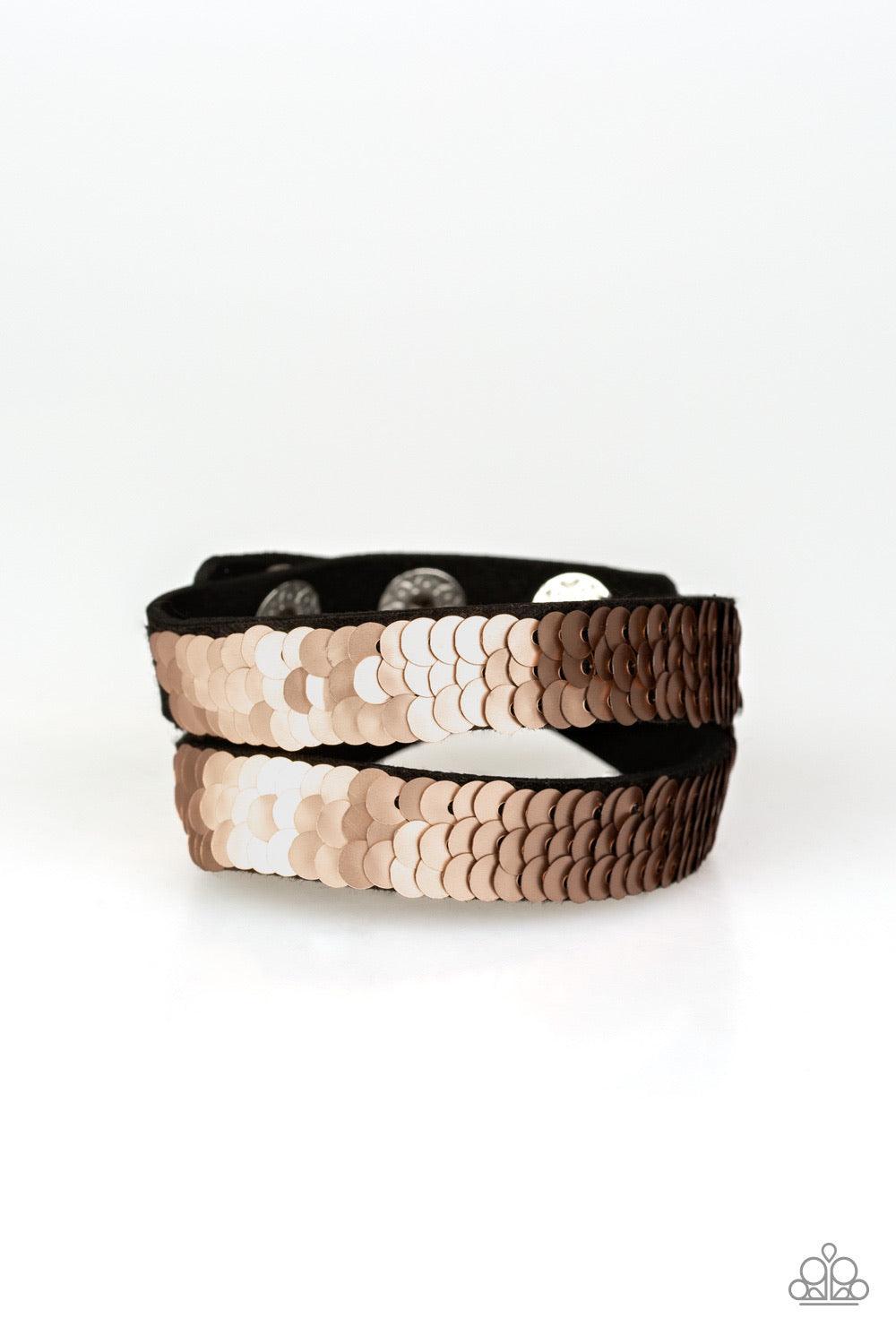 Paparazzi Accessories Under the SEQUINS - Rose Gold Row after row of shimmery sequins are stitched across the front of a lengthened black suede band. The elongated band allows for a trendy double wrap design. Bracelet features reversible sequins that chan