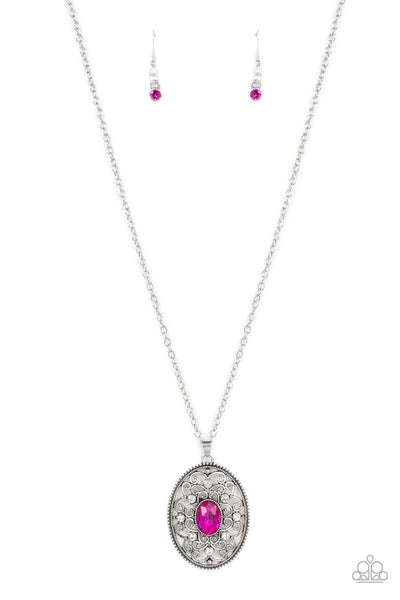 Paparazzi Accessories Sonata Swing - Pink Dainty white rhinestones are sprinkled across silver vine-like filigree that whirls around an oval pink gem center inside of a studded silver frame, resulting in a whimsical pendant at the bottom of a silver chain