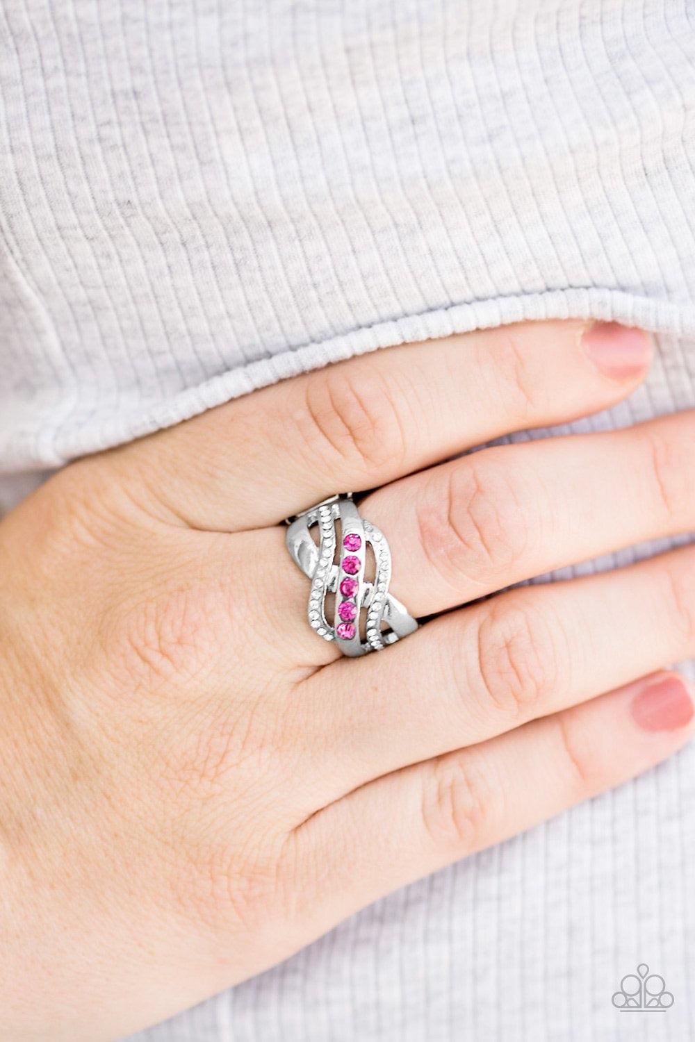 Paparazzi Accessories Flirting With Sparkle - Pink Shimmery silver bars swoop across the finger, creating an airy band. Complemented with dainty white rhinestones, the centermost silver band is encrusted in glittery pink rhinestones for a flirtatious fini