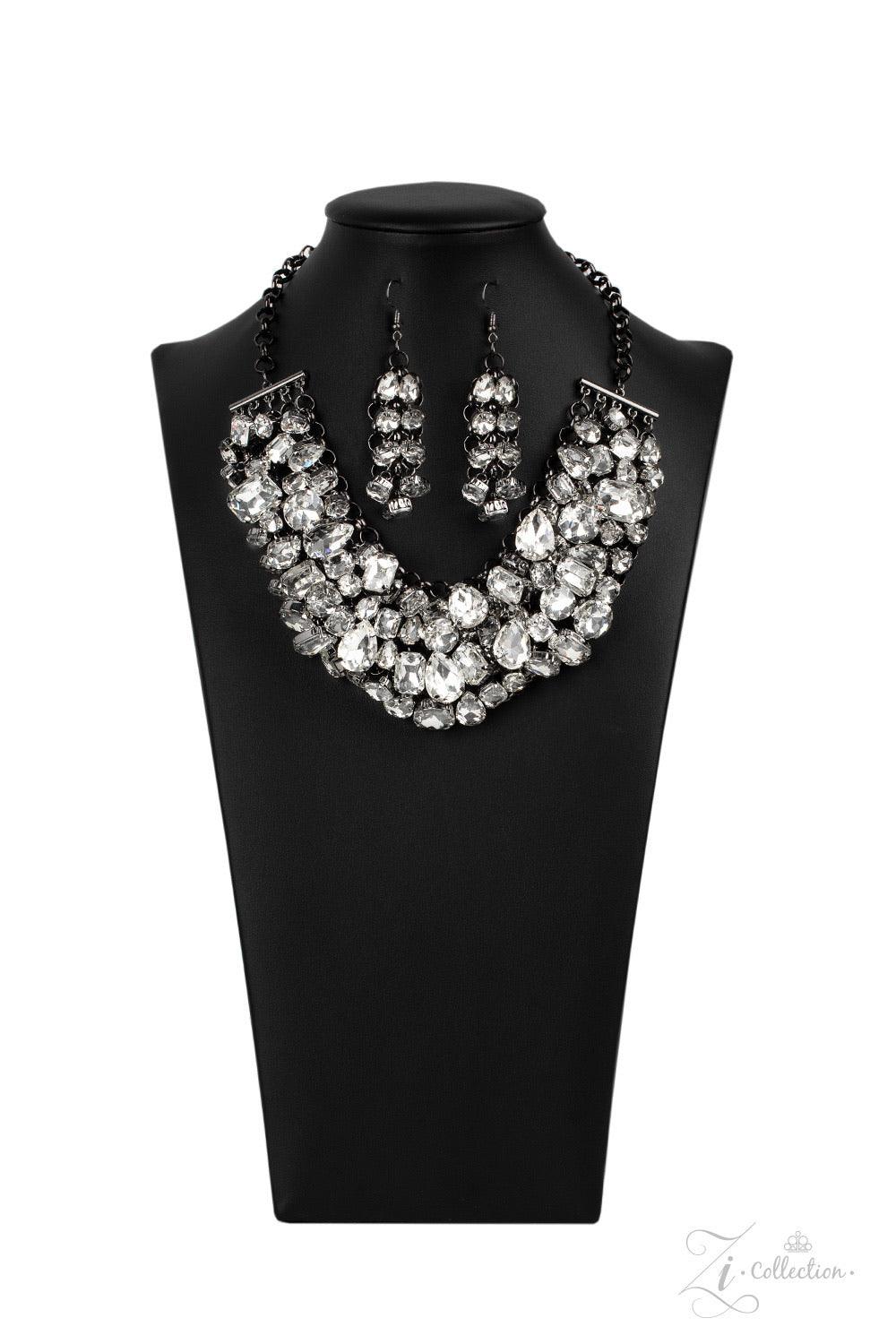 Paparazzi Accessories Ambitious 💗💗ZiCollection $25💗💗 A modern mashup of round, teardrop, and emerald cut white rhinestones link into jam-packed rows of jaw-dropping radiance. Attached to an interconnected gunmetal mesh backdrop, the clustered fringe f