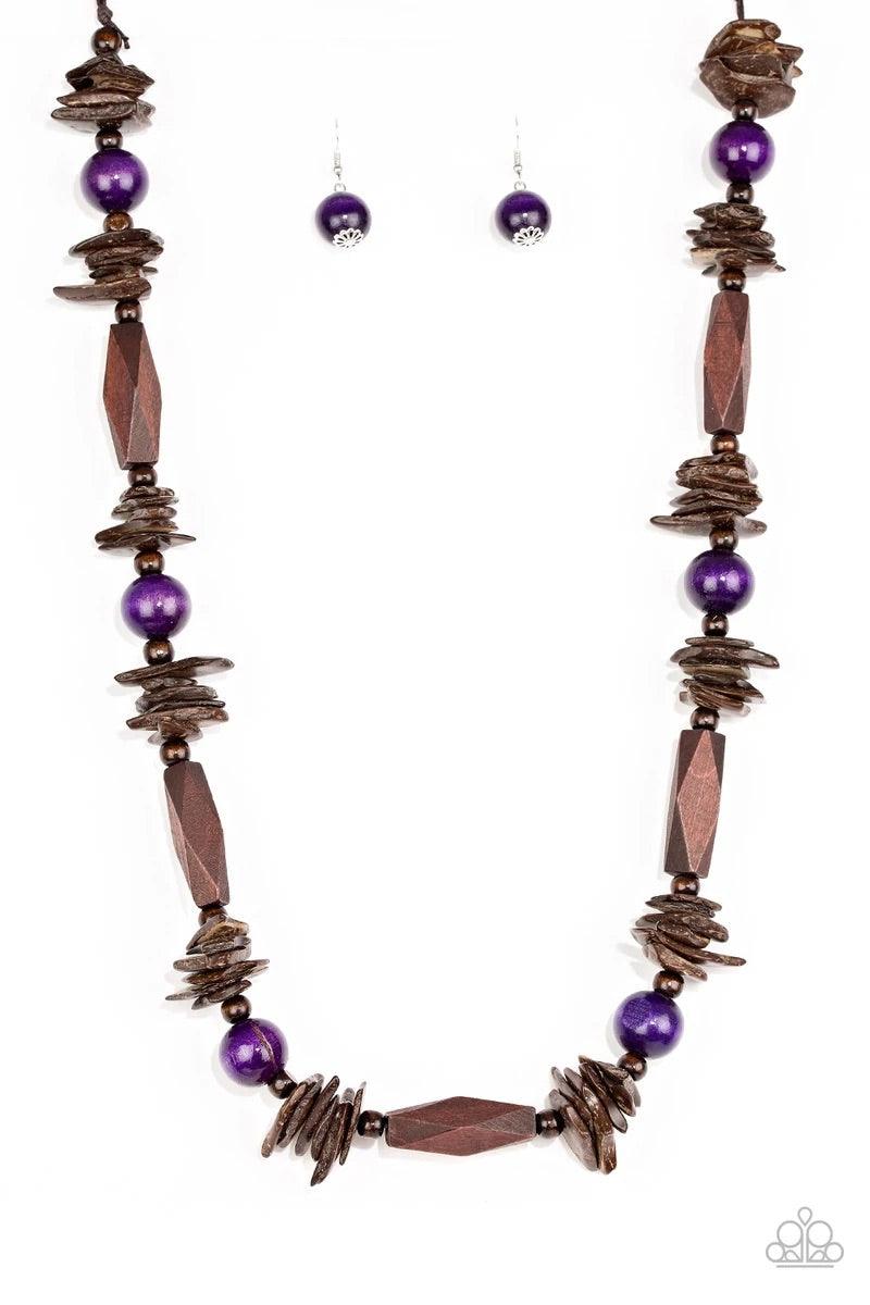 Paparazzi Accessories Cozumel Coast - Purple Featuring round, faceted, and distressed finishes, mismatched brown wooden beads are threaded along shiny brown cording. Vivacious purple wooden beads trickle between the earthy accents, adding a colorful finis