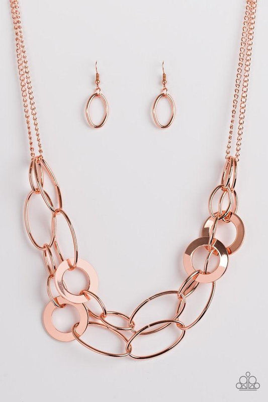 Paparazzi Accessories Metallic Maverick - Copper Mismatched shiny copper rings and hoops link below the collar in bold layers for a spunky industrial look. Features an adjustable clasp closure. Sold as one individual necklace. Includes one pair of matchin