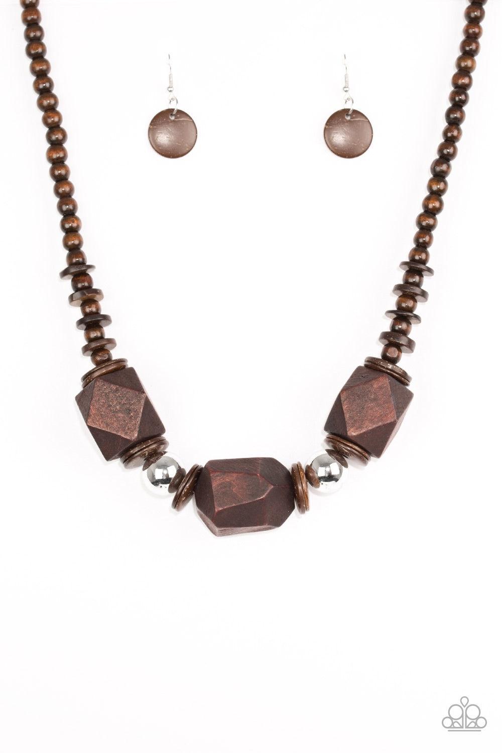 Paparazzi Accessories Costa Maya Majesty - Brown Featuring abstract geometric finishes, mismatched brown wooden beads are threaded along shiny brown cording. Dramatic silver beads are sprinkled between the earthy beading, creating a bold seasonal look bel
