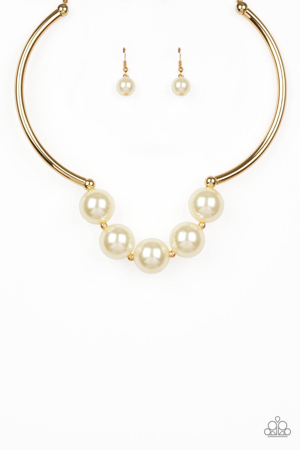 Paparazzi Accessories Welcome To Wall Street - Gold Threaded along an invisible wire, two arching gold bars give way to a collection of dainty gold beads and oversized white pearls for a dramatic look below the collar. Features an adjustable clasp closure