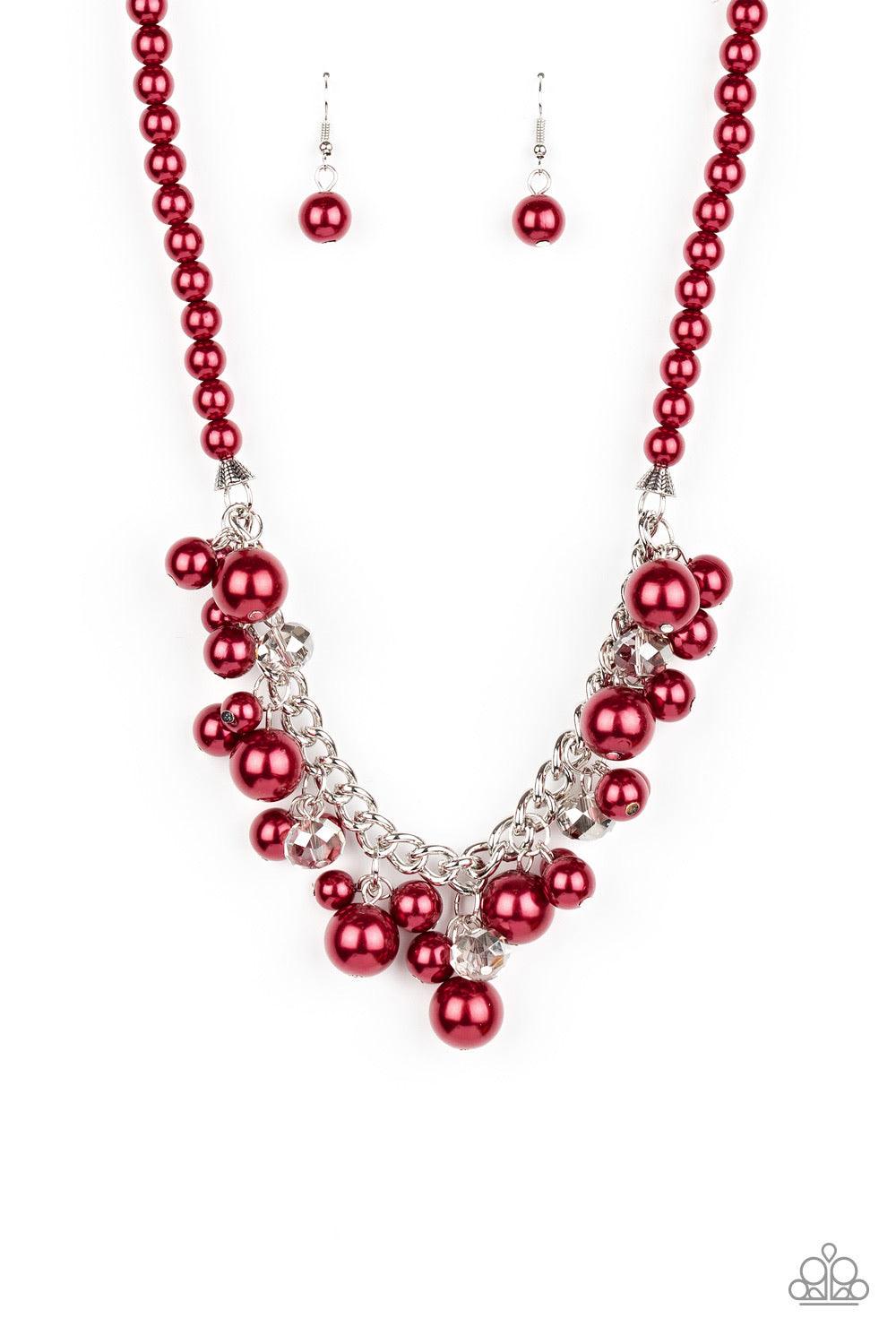 Paparazzi Accessories Prim And POLISHED - Red Threaded along an invisible wire, a pearly strand of red beads gives way to a section of chunky silver chain below the collar. Clusters of pearly red beads and smoky metallic-flecked crystals swing from the ch