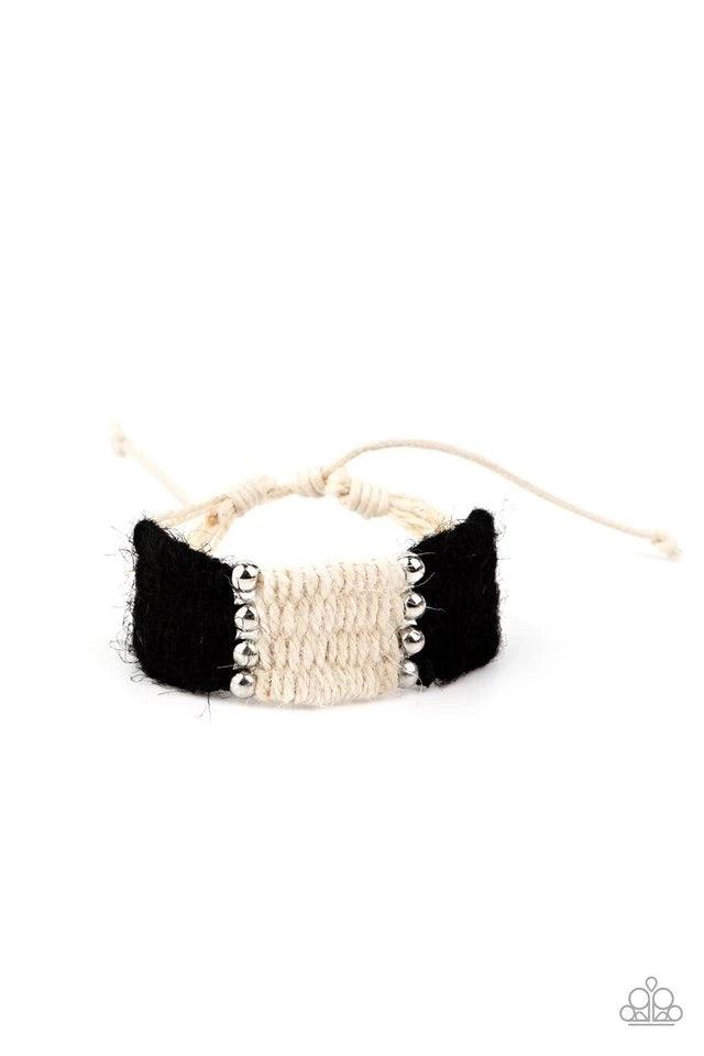 Paparazzi Accessories High Tides - Black Infused with classic silver beads, white and black twine-like cording knots and weaves around the wrist for a colorful beach inspired look. Features an adjustable sliding knot closure. Jewelry