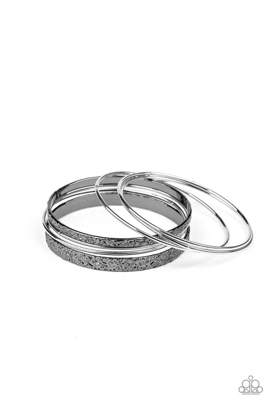 Paparazzi Accessories Full Circle - Multi Brushed in a high-sheen shimmer, a collection of smooth silver and heavily textured gunmetal bangles slides up and down the wrist for an edgy stacked look. Jewelry