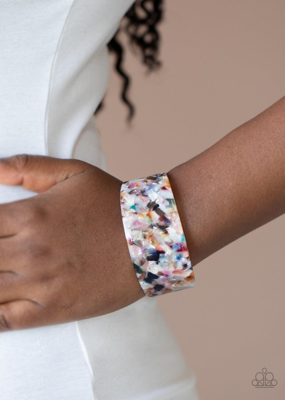 Paparazzi Accessories HAUTE Under The Collar - Multi Speckled in a colorful tortoise shell pattern, a multicolored acrylic cuff delicately curls around the wrist for a retro flair. Sold as one individual bracelet. Jewelry