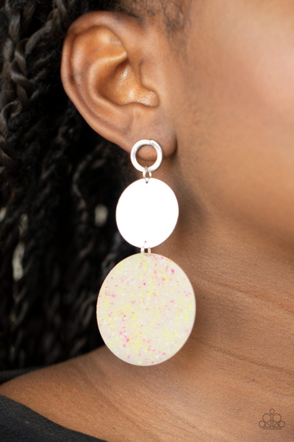 Paparazzi Accessories Beach Day Glow - Yellow A speckled acrylic circle swings from the bottom of a glistening silver disc that is attached to an airy circle fitting. The shiny trio links into a colorful lure for a retro look. Earring attaches to a standa