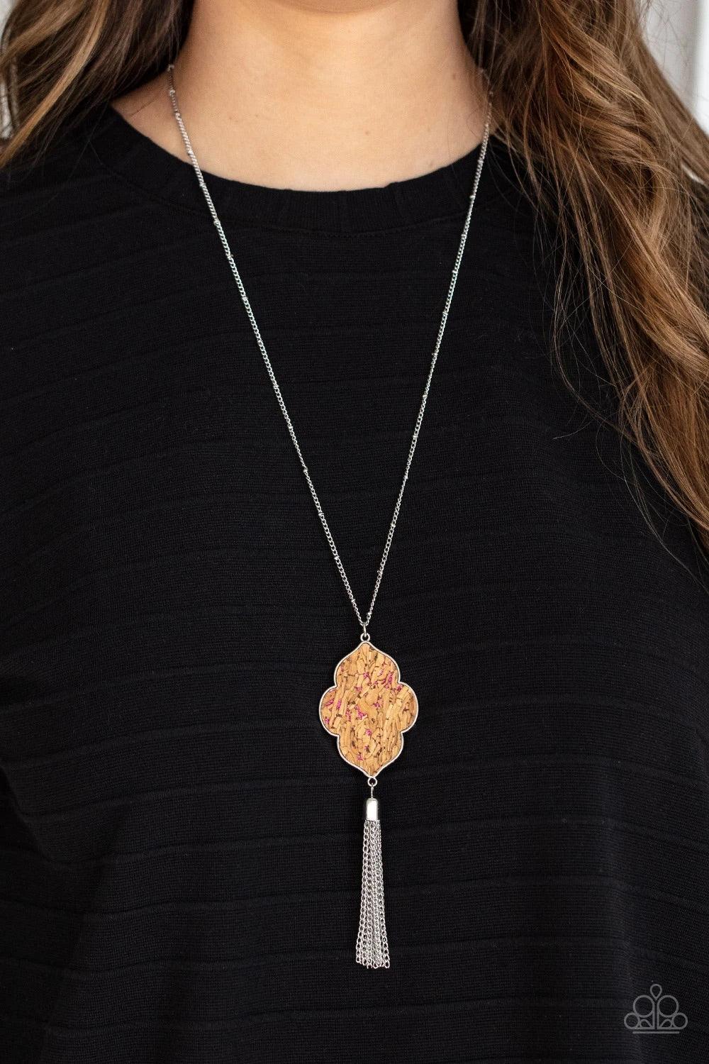 Paparazzi Accessories One Night in Casablanca - Pink Flecked in glittery pink sparkles, a scalloped cork frame is pressed into a sleek silver frame at the bottom of a dainty silver satellite chain. A classic silver chain tassel swings from the whimsical p