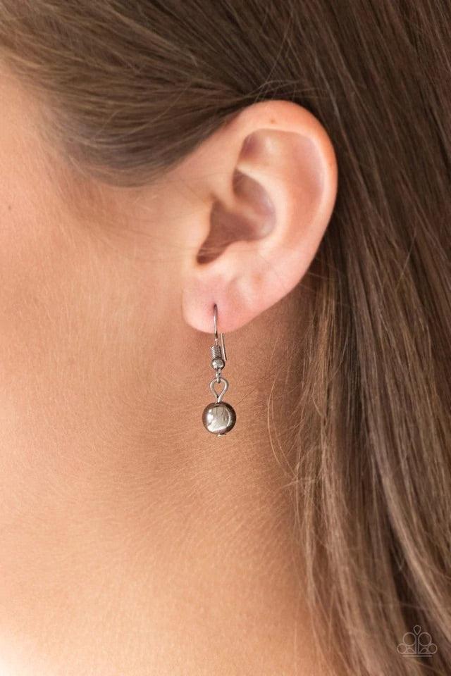 Paparazzi Accessories High Stakes FAME - Multi Gradually increasing in size near the center, glistening gold and gunmetal beads are threaded along an invisible wire below the collar. Encrusted in smoky rhinestones, a sparkling gunmetal bead adorns the cen