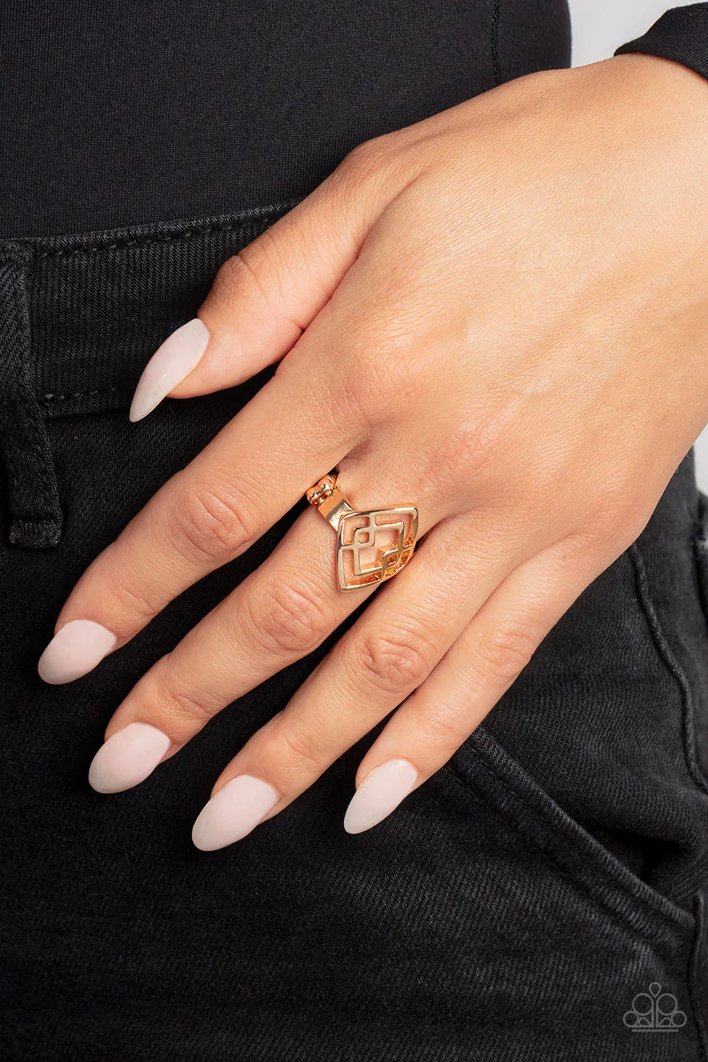 Paparazzi Accessories Diamond Duo - Gold Gold diamond silhouettes stack and interlock into an optical illusion atop the finger, resulting in an edgy geometric statement piece. Features a dainty stretchy band for a flexible fit. Sold as one individual ring