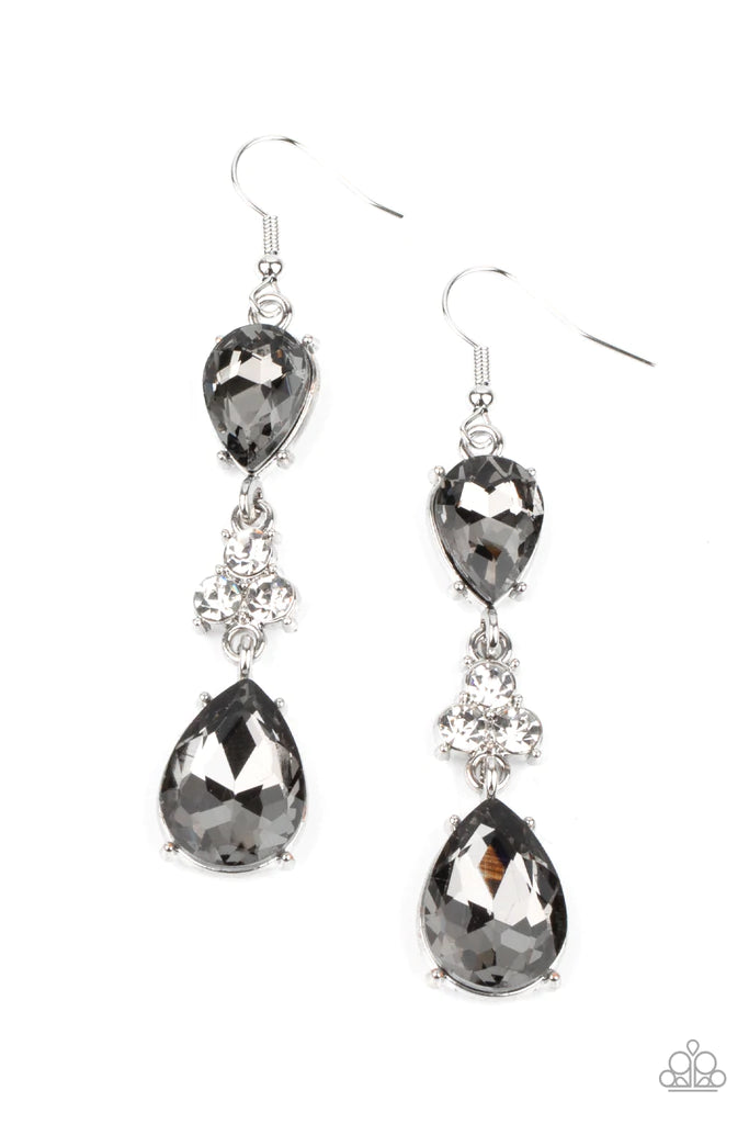 Paparazzi Accessories Once Upon A Twinkle - Silver A trio of dazzling white rhinestones unites two smoky teardrop gems as they dangle brilliantly from the ear for a flawless finish. Earring attaches to a standard fishhook fitting. Sold as one pair of earr