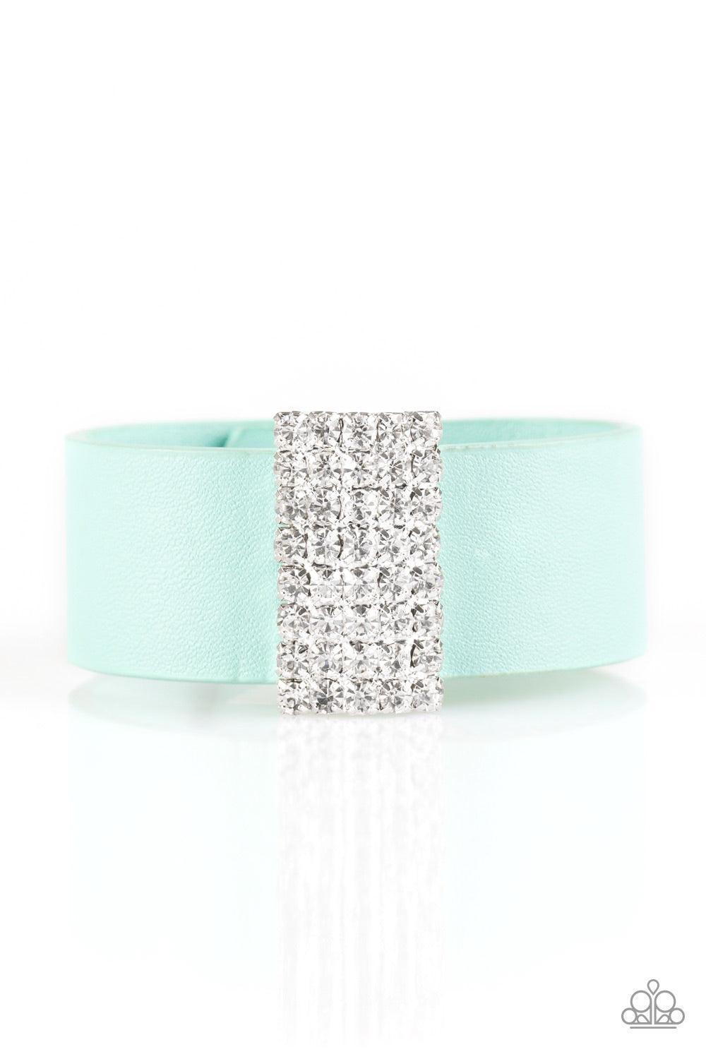 Paparazzi Accessories Walk The CATWALK - Green Encrusted in glittery white rhinestones, a sparkling frame slides along a strip of green leather, creating a blinding centerpiece. Features an adjustable snap closure. Jewelry