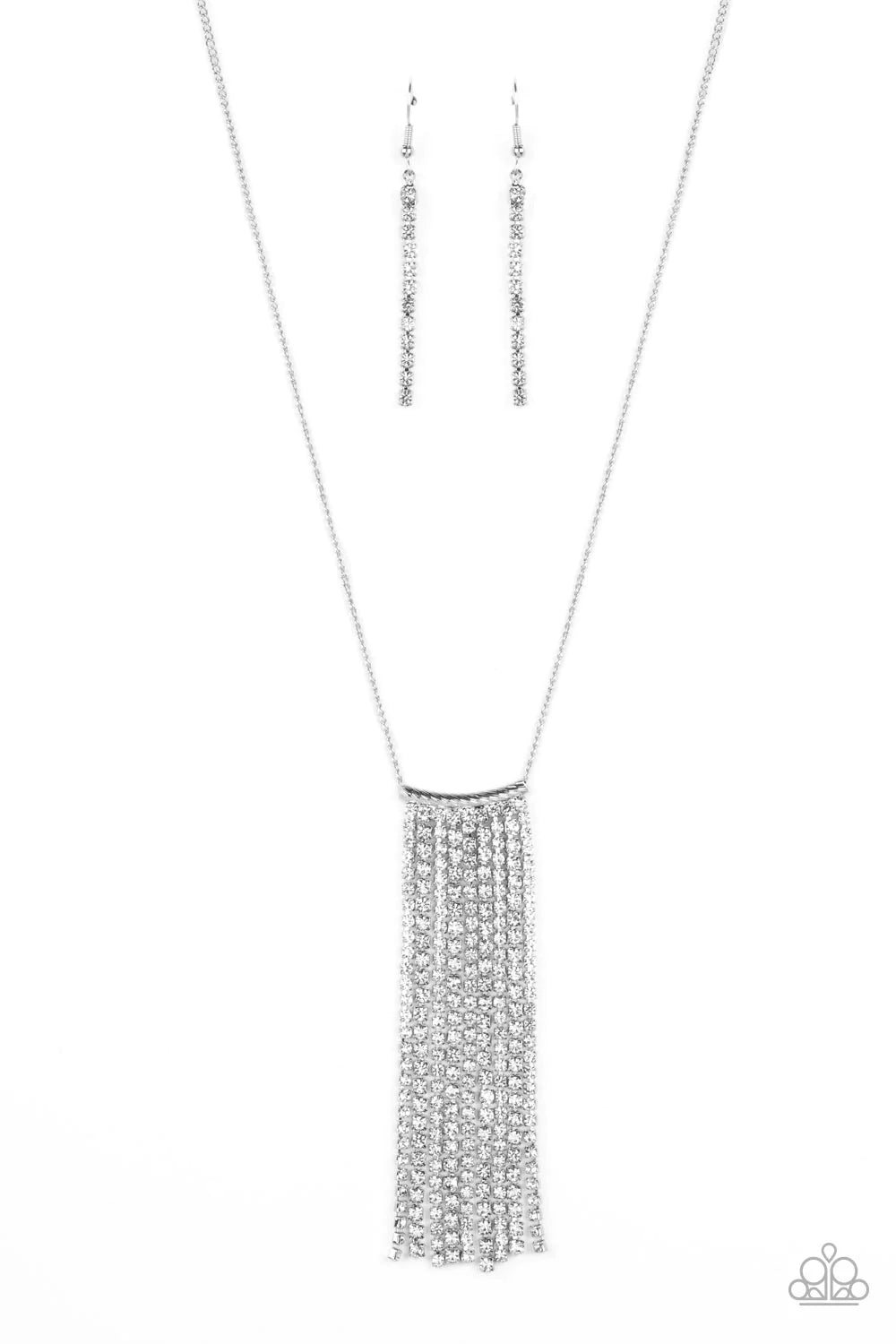 Paparazzi Accessories Stellar Crescendo - White A silver chain holding cascades of glittery white rhinestones, waterfall down the chest. The exaggerated tassels glitter at the bottom of an extended silver chain, adding extra refinement to the statement pi