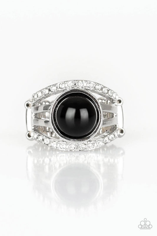 Paparazzi Accessories A Big Break - Black Radiating with glassy white rhinestones, row after row of glittering silver bars arc across the finger. A shiny black bead is pressed into the center of the layered bands, adding a dramatically refined finish to t