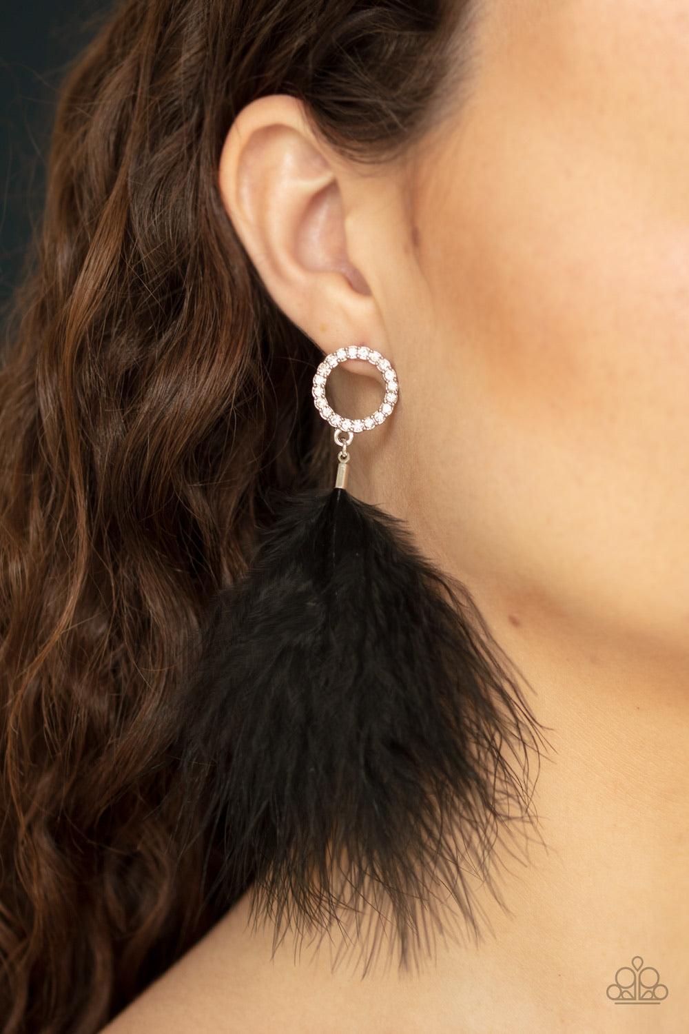 Paparazzi Accessories BOA Down - Black A fuzzy black feather swings from the bottom of a white rhinestone encrusted silver ring, creating a refined lure. Earring attaches to a standard post fitting. Sold as one pair of post earrings. Jewelry