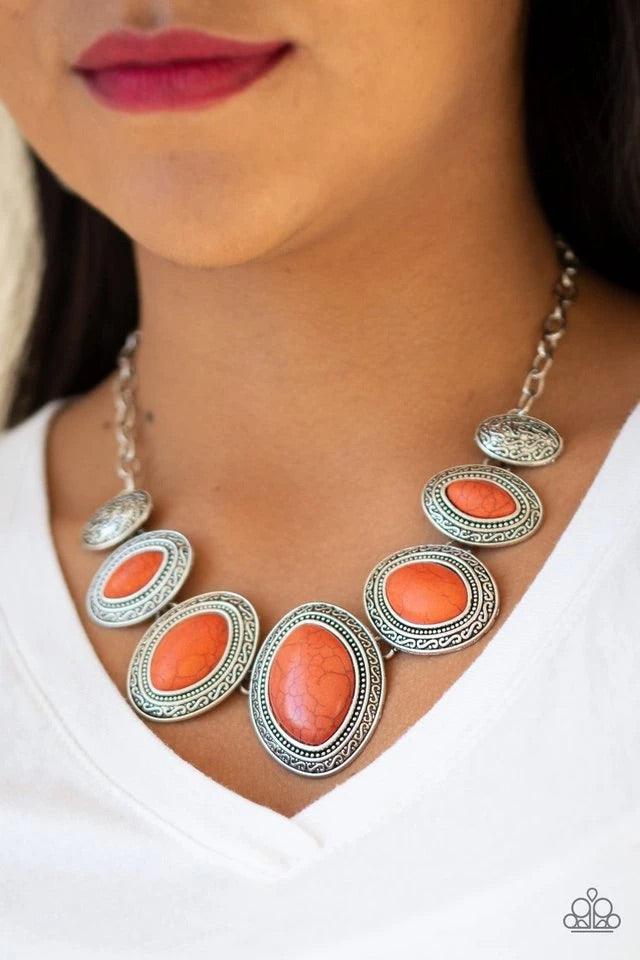 Paparazzi Accessories Sierra Serenity - Orange Gradually increasing in size near the center, vivacious orange stones are pressed into textured silver frames below the collar for a tribal inspired look. Features an adjustable clasp closure. Sold as one ind