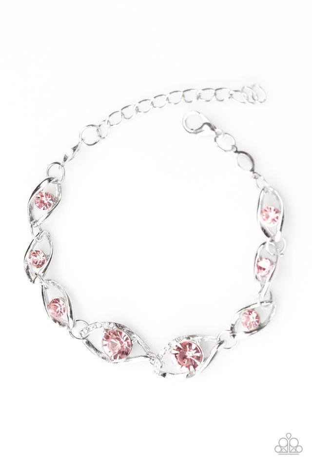 Paparazzi Accessories Rich is Rich - Pink Pink rhinestones are sprinkled along silver marquise-shaped frames, creating a glitzy chain around the wrist. Dazzling pink rhinestones embellish two of the larger silver frames, adding a hint of refined shimmer t