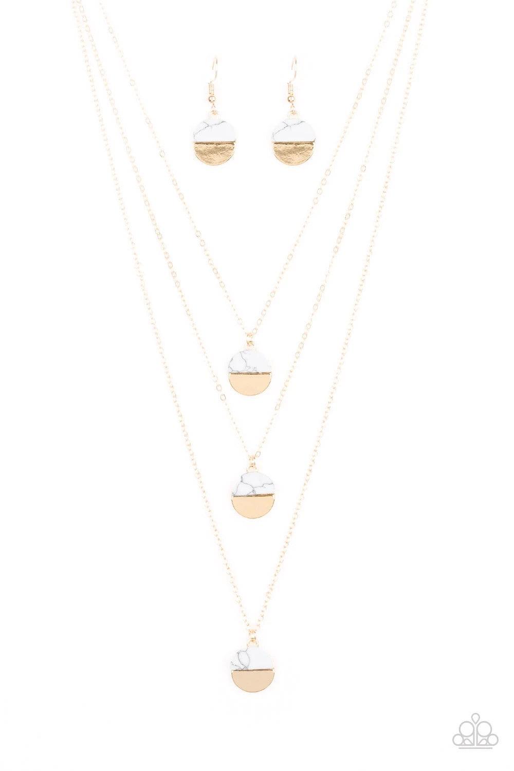 Paparazzi Accessories Rural Reconstruction - Gold Featuring refreshing white stone accents, a trio of gold discs layer down the chest for a seasonal look. Features an adjustable clasp closure. Sold as one individual necklace. Includes one pair of matching