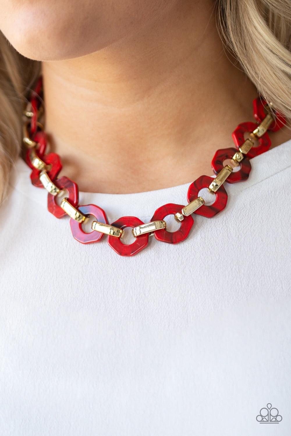 Paparazzi Accessories Fashionista Fever - Red Glistening gold fittings link with red hexagon-like acrylic frames below the collar for a seasonal flair. Features an adjustable clasp closure Jewelry